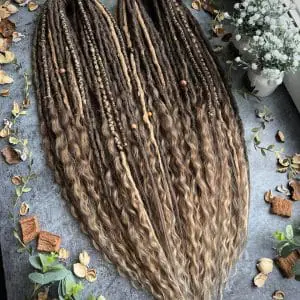 Light brown boho dreads and curls, the effect sun-bleached hairs