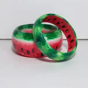 A set of wide bracelets in the shape of a watermelon