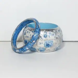 A stylish set of 2 bracelets. Blue roses on a white background with silver enamel.