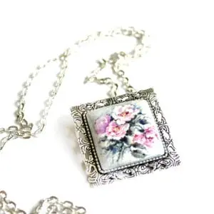 The brooch-pendant on a chain «Delicate flowers»