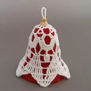 PDF Pattern Crochet. Bell "Lily" with a height of 1.97 inches. It contains scheme, instructions, photos, and a description of the bell block.