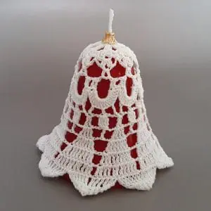PDF Pattern Crochet. Bell "Lily" with a height of 2,76 inches. It contains scheme, instructions, photos, and a description of the bell block.
