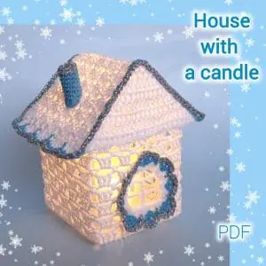 PDF Pattern Crochet. A house with a candle. The height is 4.33 inches. It is a three-dimensional toy for Christmas decor.