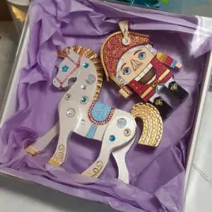 These are hand-painted wooden figurines. Cute characters from a Soviet cartoon