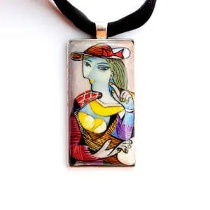 A black velvet choker with a hand-painted pendant