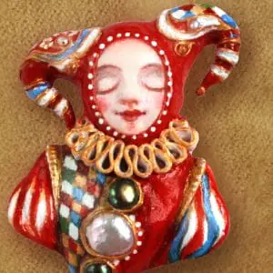 The Harlequin brooch with natural pearls