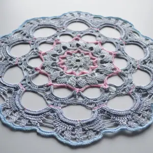 Crocheted decorative napkin