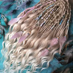 Strawberry and cream blonde synthetic dreadlocks with curls