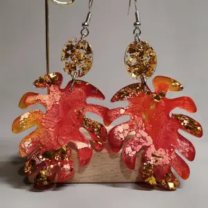 Monster leaf earrings, orange colored earrings