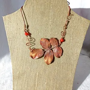 A copper necklace made of leaves. Hand made.