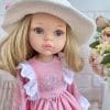 Close up of cotton mouse print fabric and lace trim on handmade doll dress