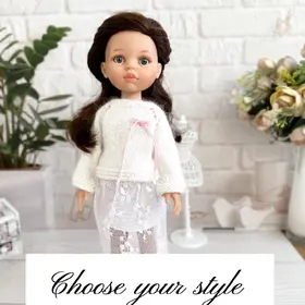 paola reina doll wearing lace skirt top and soft mohair sweater