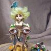 doll little fairy elf and snail and butterfly