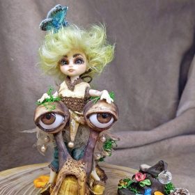 doll little fairy elf and snail and butterfly