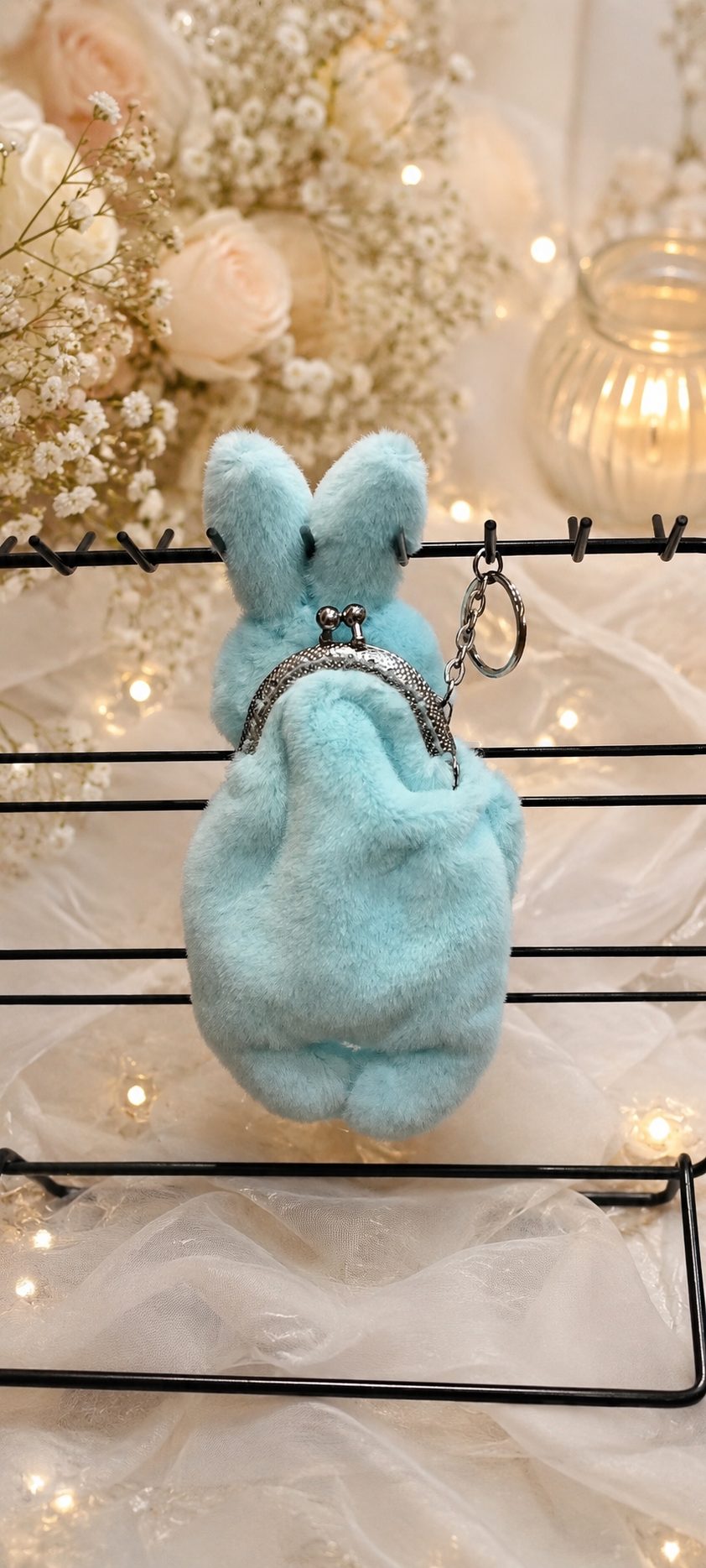 A wallet in the shape of a plush bunny. 1 chatgpt image 26 maja 2026 g. 21 20 04