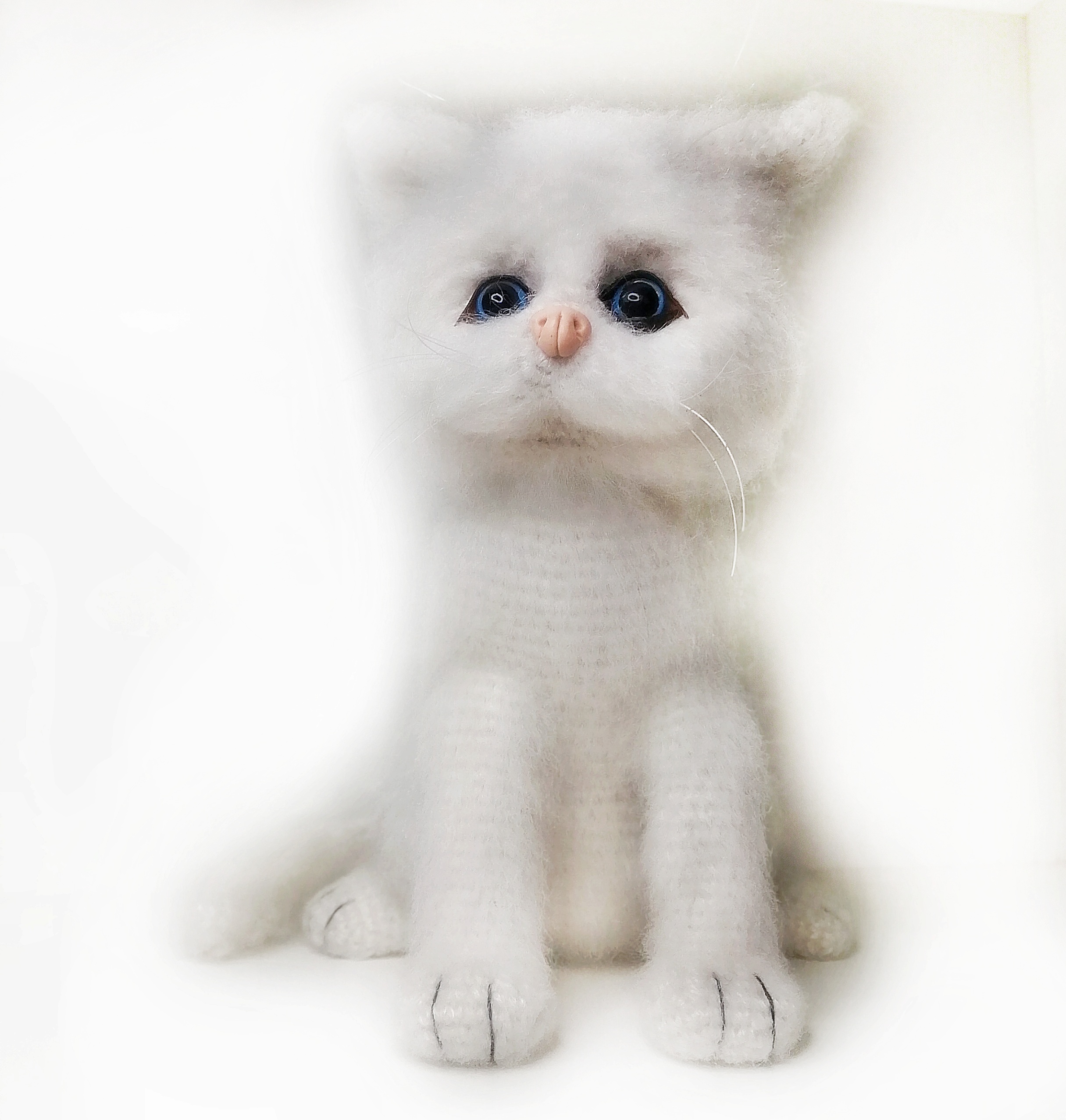 white cat doll