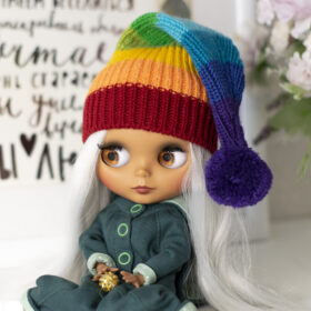 Blythe doll in rainbow Irish elf hat on St. Patrick's Day