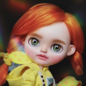 Blythe doll with sculpted face, open mouth with teeth and red natural hair