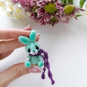 Crochet miniature plush bunny in hand