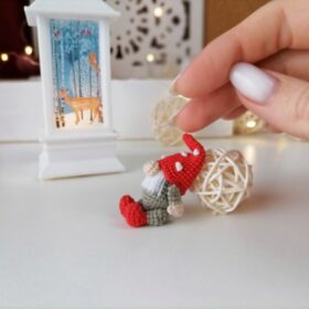 Crochet miniature red gnome side view