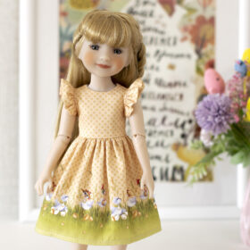 A 14-inch Ruby Red Fashion Friends doll in a cute Easter dress