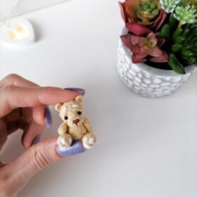 Crochet miniature plush Teddy Bear in hand