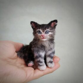 Miniature realistic kitten