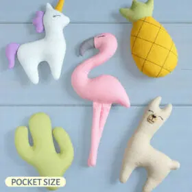 Handmade pocket size toys: unicorn, llama, pineapple, cactus and flamingo