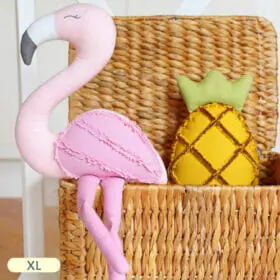Flamingo and pineapple stuffed toys