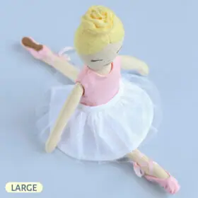 Handmade ballerina rag doll dressed in tutu skirt and pointe shoes