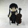 Plush crochet Wednesday Addams amigurumi toy, inspired by The Addams Family, handmade pattern