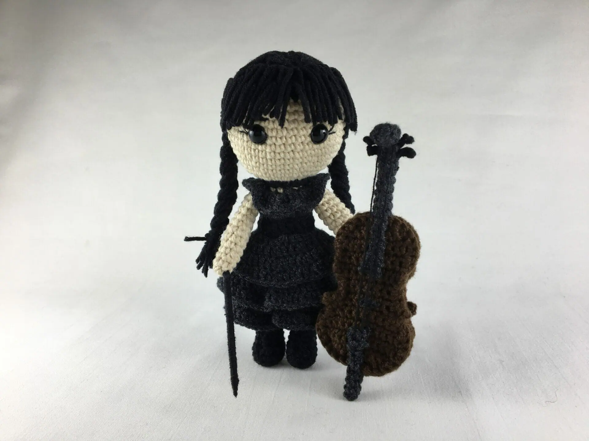 Crochet Wednesday Addams Pattern – Plush Amigurumi Toy Plush crochet Wednesday Addams amigurumi toy, inspired by The Addams Family, handmade pattern