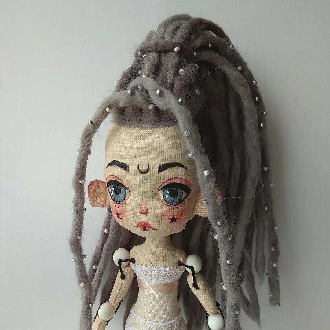 White Queen doll with dreadlocks and tattoos