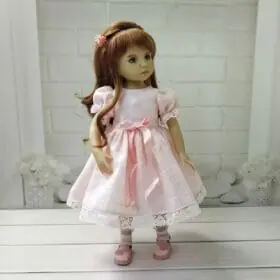 Pink textured dress for dolls.