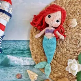 Beautiful mermaid doll with red hair