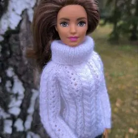 Barbie doll in right view white knit sweater