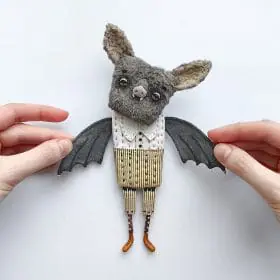 textile art doll bat in stripped pants