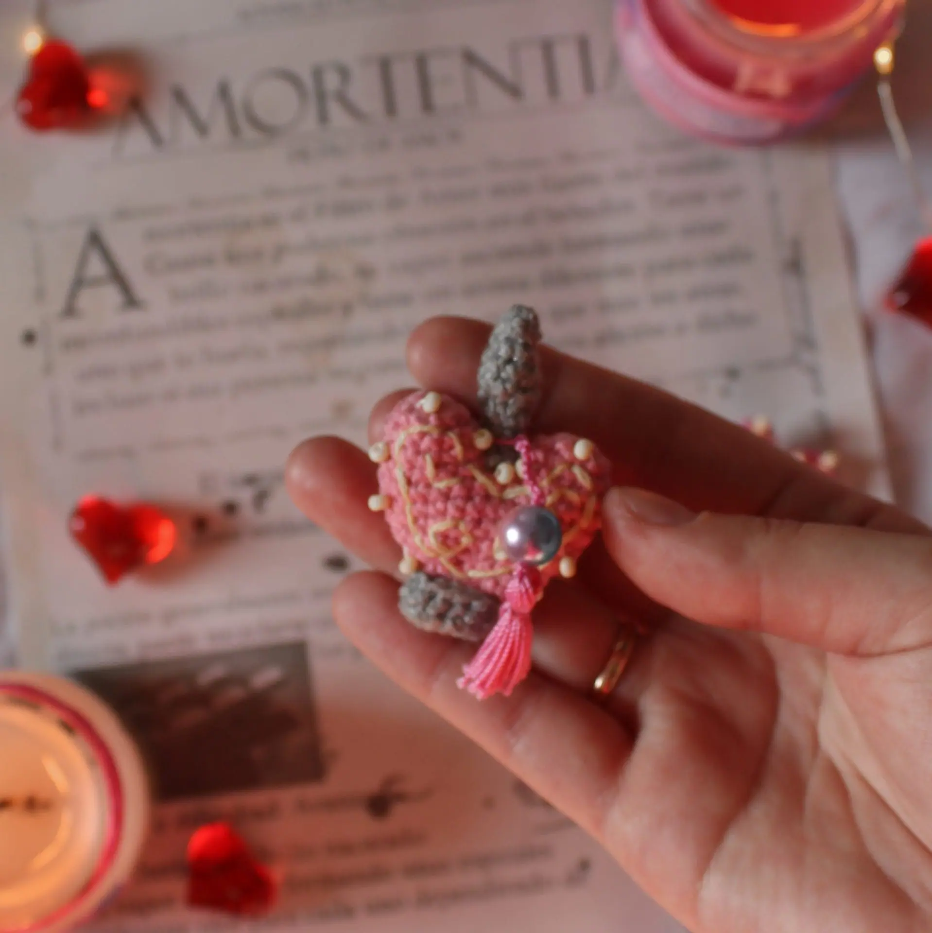 A keychain and a brooch in the form of an Amortentia A keychain and a brooch in the form of an Amortentia