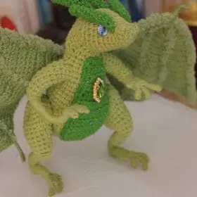 The Welsh green dragon. A collectible toy. Knitted dragon.