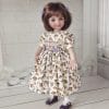 Little Darling smocked dress with olive and violets