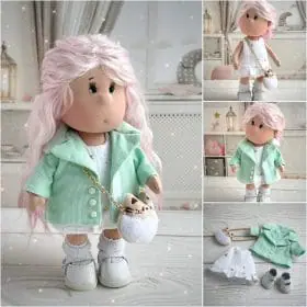 Handmade doll in mint coat. Rag doll with pink hair