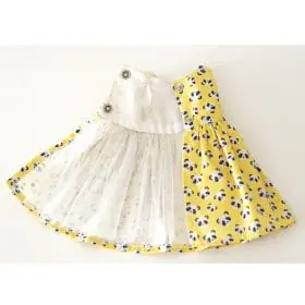 Yellow summer dress with a print of lemons and cute pandas on 13-inch Paola Reina dolls.