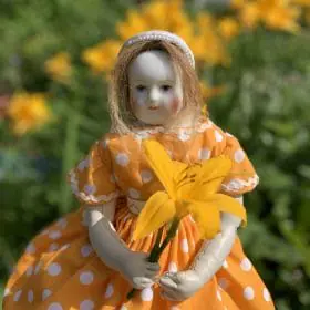 Yellow dress for a fashion doll