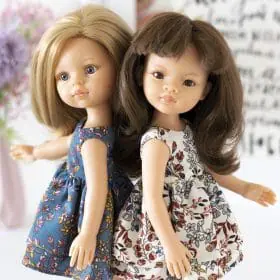 Paola Reina dolls in handmade dresses with floral print.