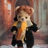 Cedric Diggory in a Hufflepuff school uniform.