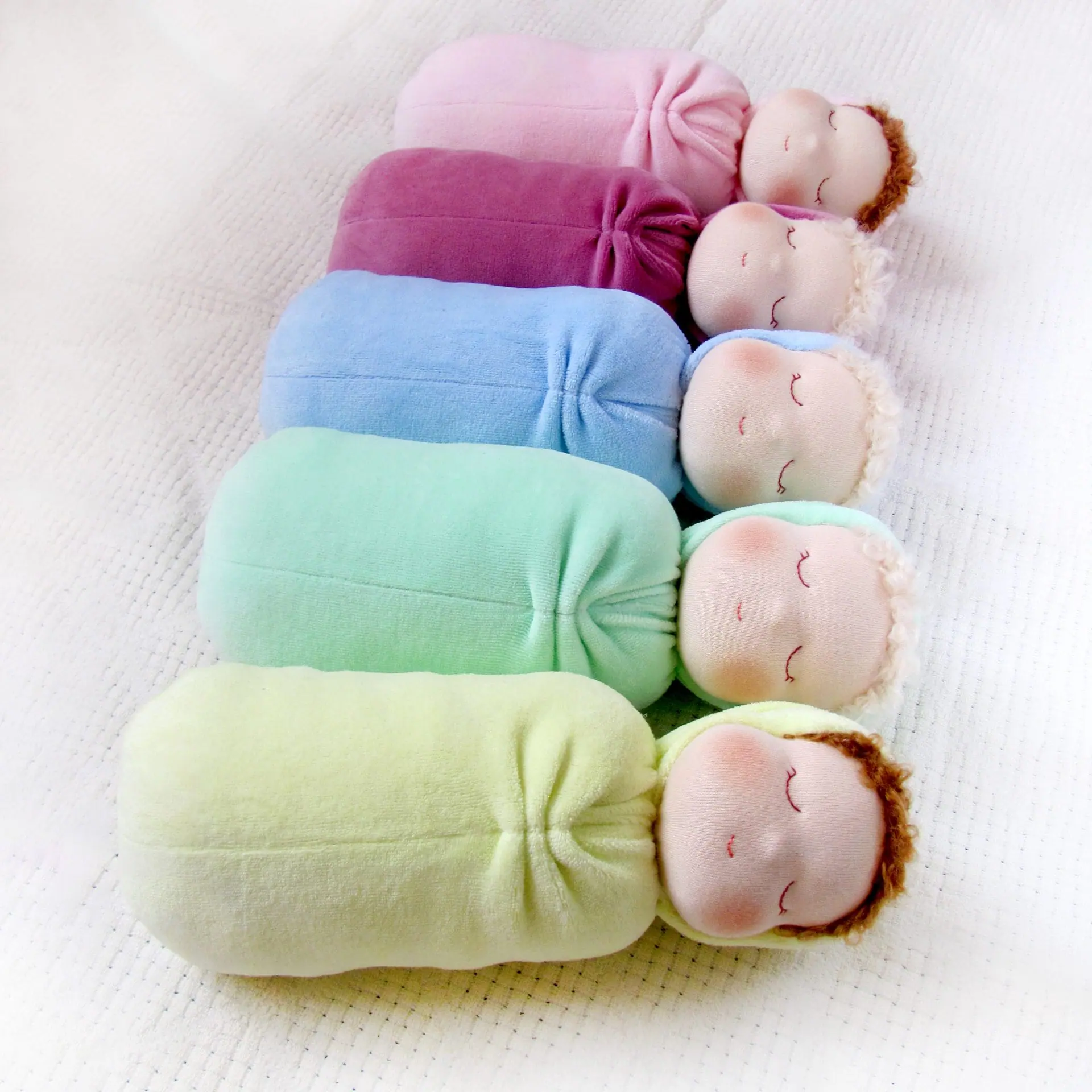 DIY Waldorf swaddle sleeping doll 11 inch/27 cm tall. PDF pattern 8 DIY Waldorf swaddle sleeping doll 11 inch (27 cm) tall. PDF sewing pattern and tutorial.