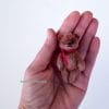 tiny stuffed bear