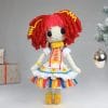Plush crochet clown doll Penny amigurumi toy in an elegant costume, handmade pattern