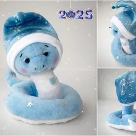 Christmas plush soft snake. Handmade cute snake boy in holiday hat for home decor. Christmas snake for gift.