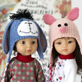 Paola Reina dolls in knitted Donkey and Piglet hats from the book about Winnie the Pooh